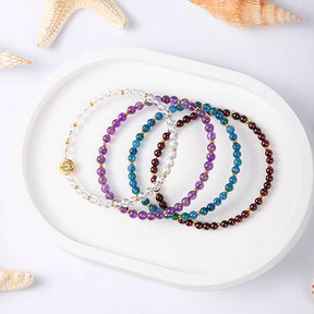 Health & Vitality Crystal Bracelet – Amethyst, Colored White Crystal & Garnet