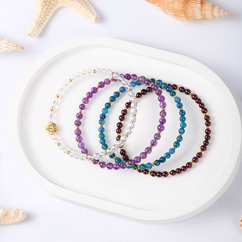 Health & Vitality Crystal Bracelet – Amethyst, Colored White Crystal & Garnet